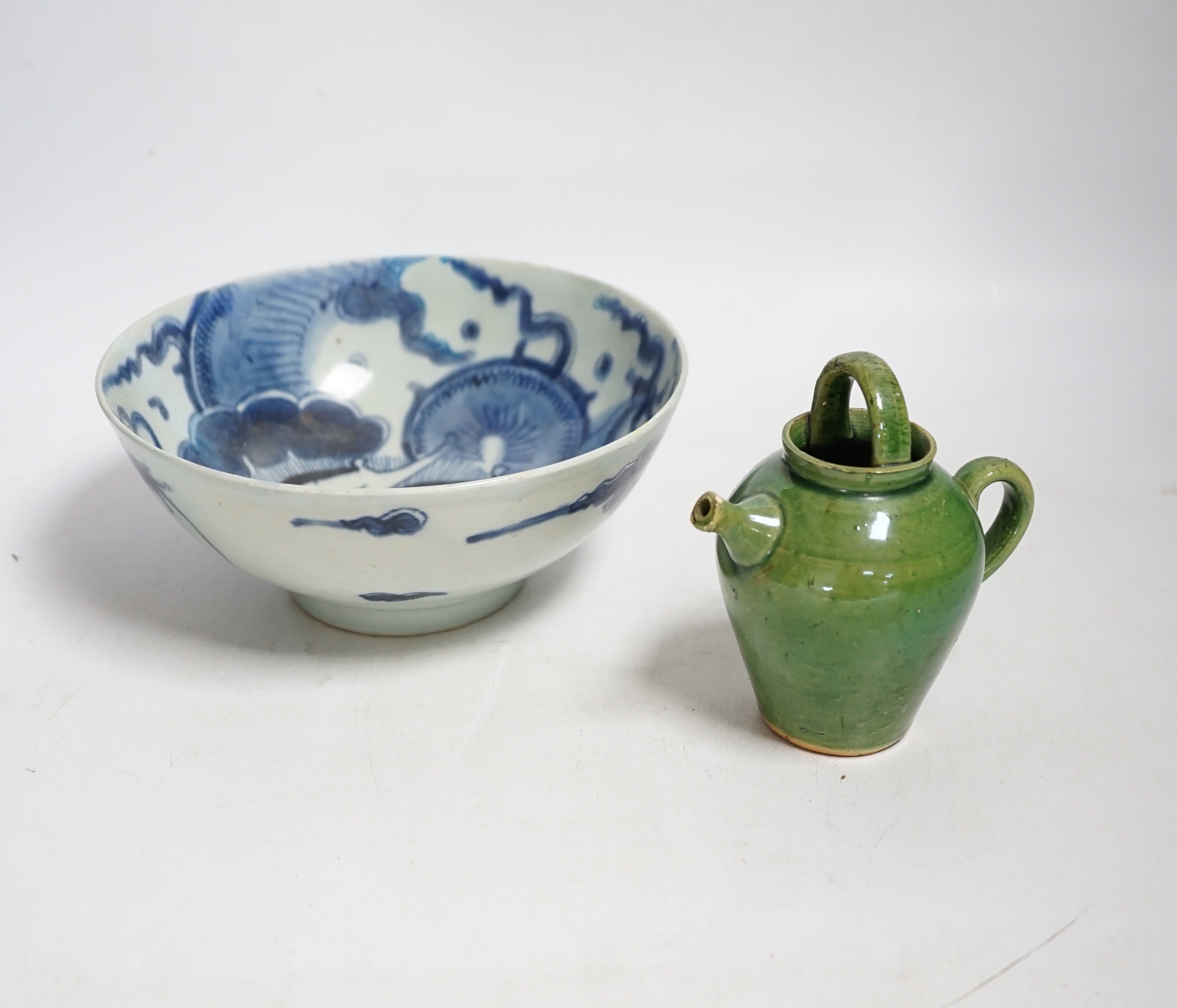 A Chinese blue and white ‘dragon’ bowl and a green glazed water pot, bowl 17.5cm diameter
